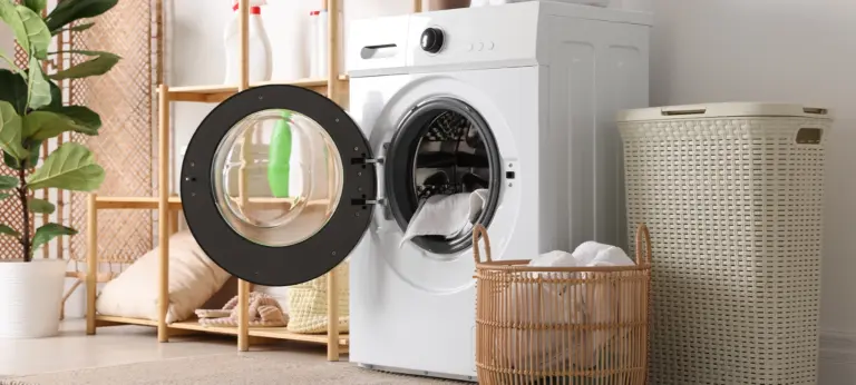 Laundry room interior with washing machine, basket, detergents and houseplants
