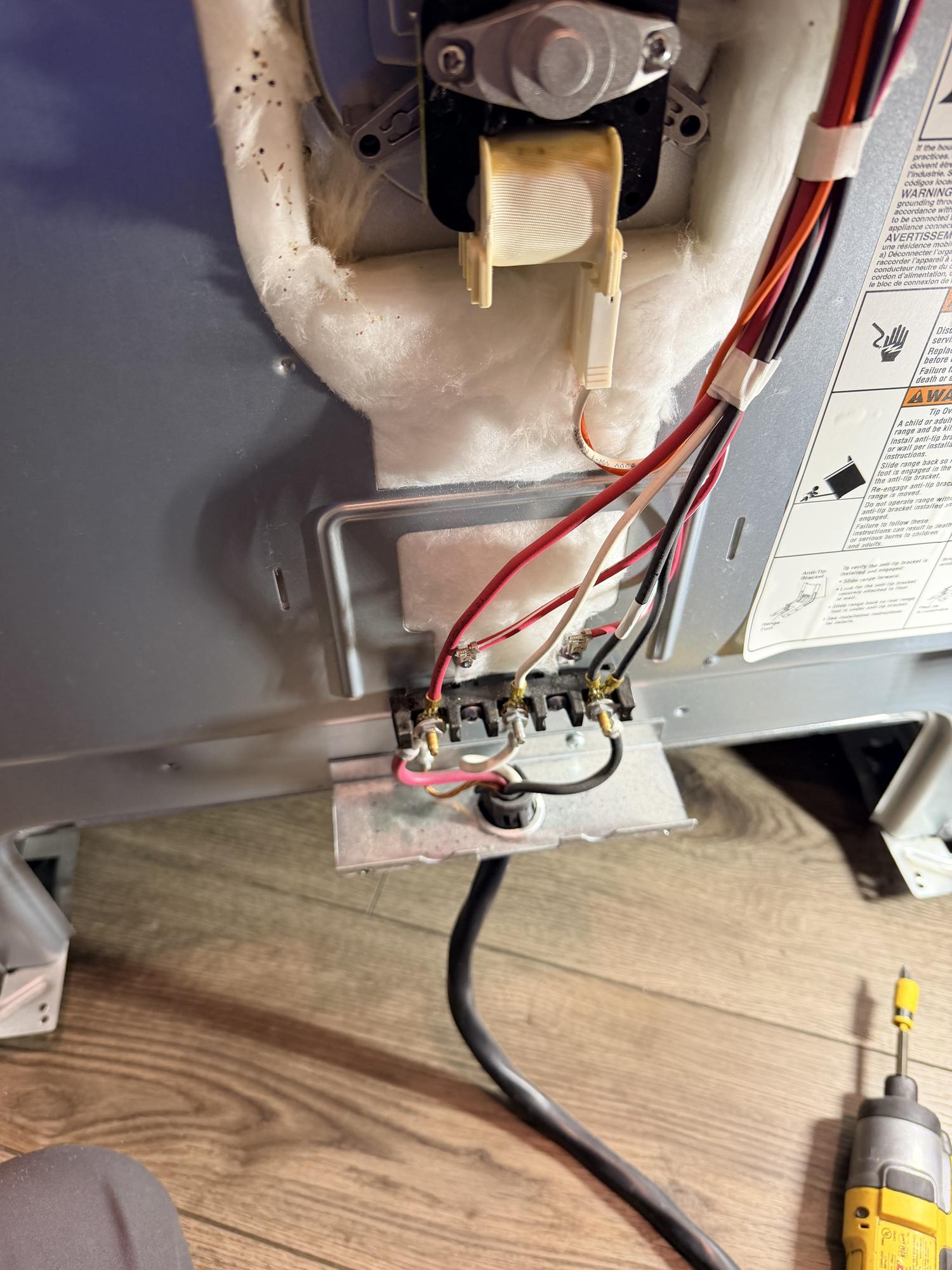 Exposed appliance wiring during repair in East York by Appliance Forever