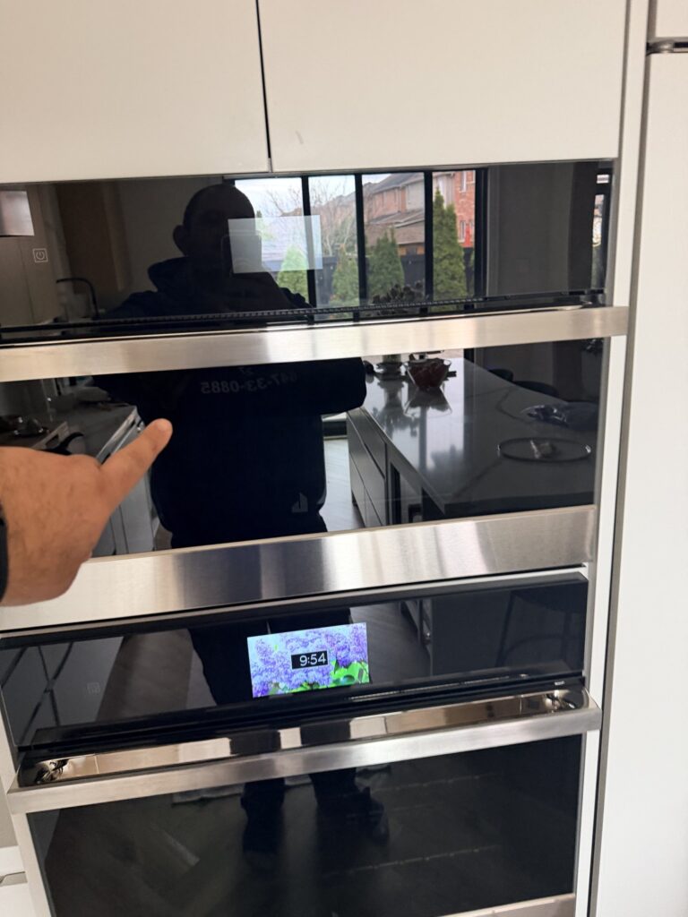 appliance repair repair woodbridge person points at applianceforever ca