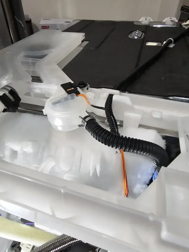 appliance repair close up appliance s internal components frost buildup wiring p