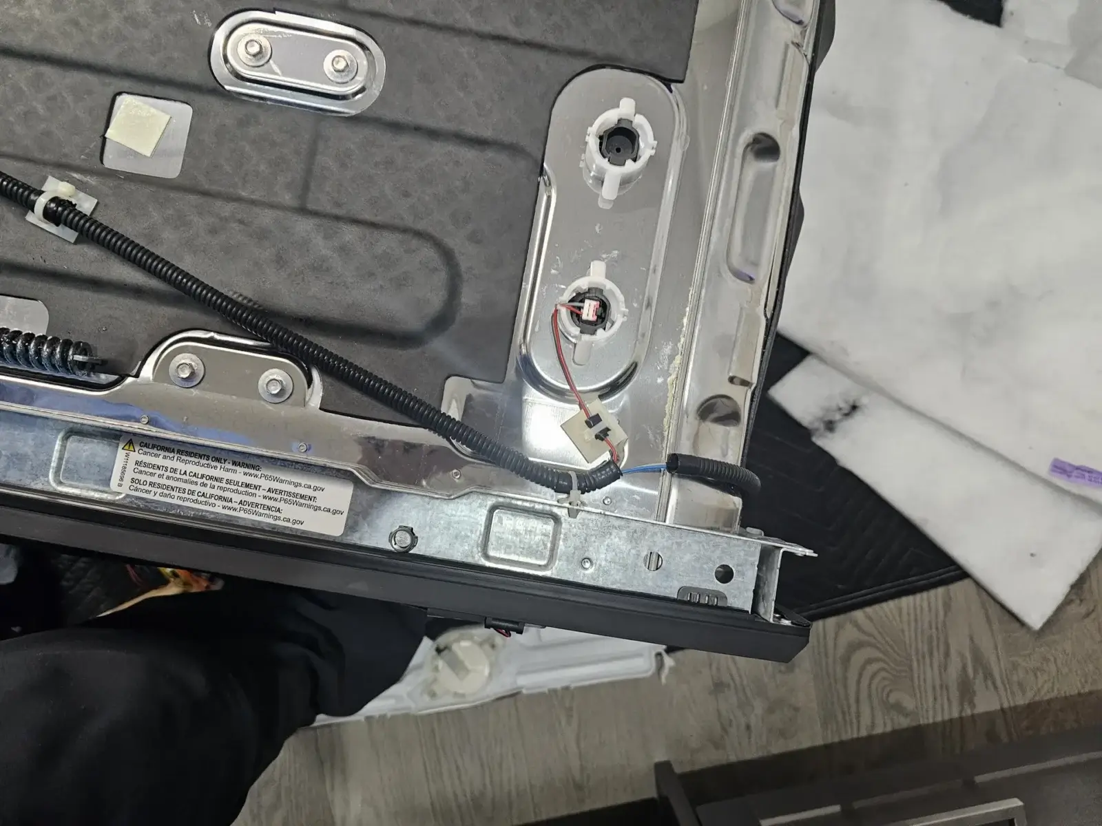 appliance repair close up car door panel s interior showing wiring insulation ph
