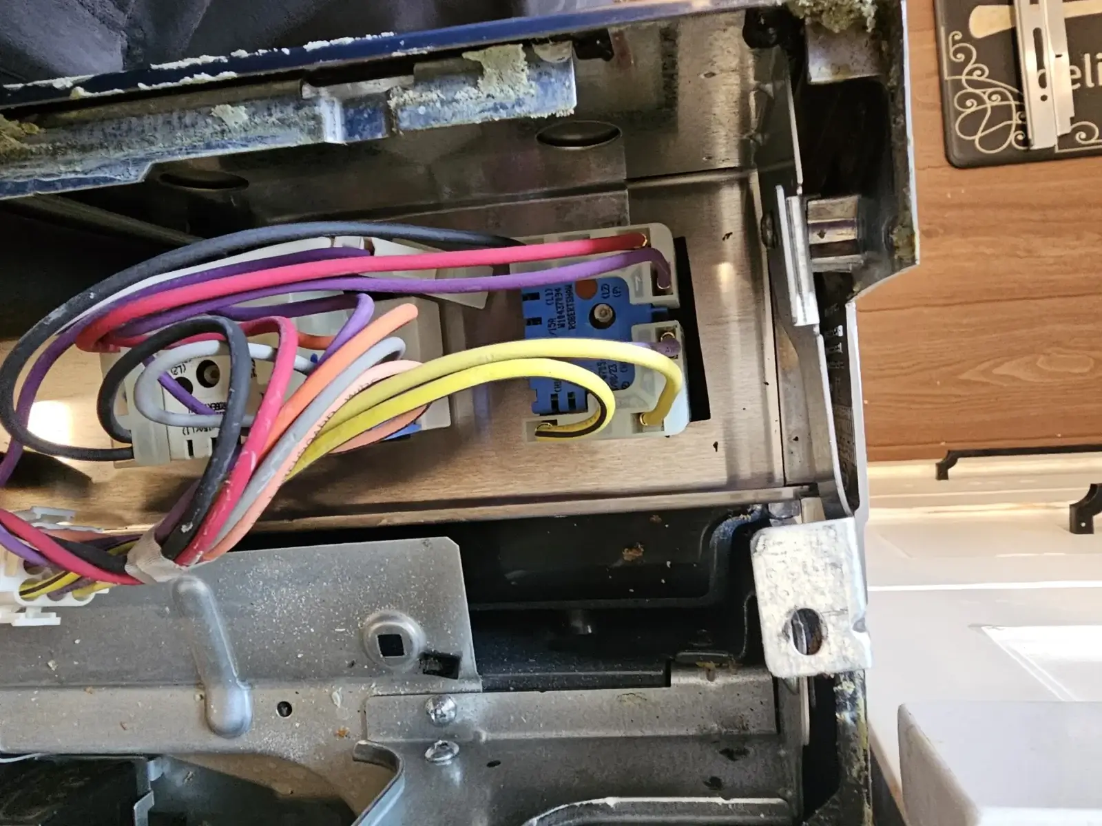 appliance repair close up colorful electrical wires metal appliance appliance fo