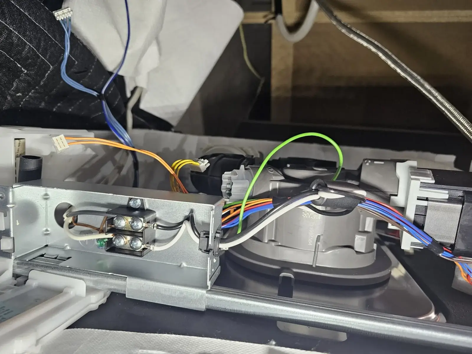 appliance repair close up internal wiring components during appliance repair app