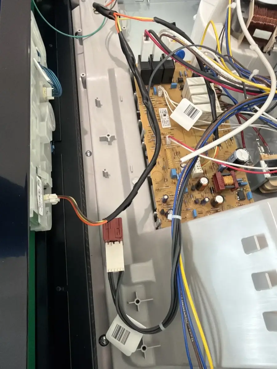 appliance repair close up open electronic device during appliance repair bradfor