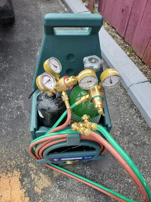 appliance repair portable welding gas tank set gauges hoses valves sits green ca
