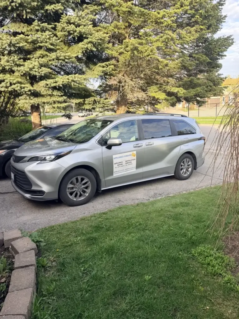 appliance repair silver minivan appliance forever appliance repair sign parked r