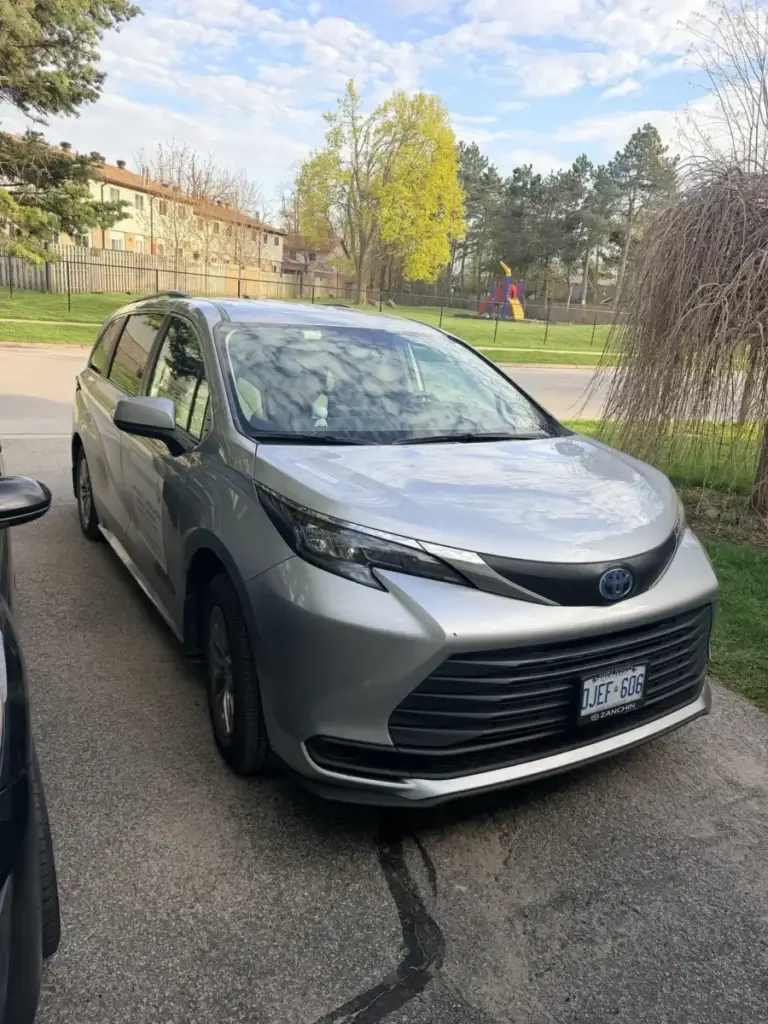 appliance repair silver toyota minivan parked residential street bradford ontari