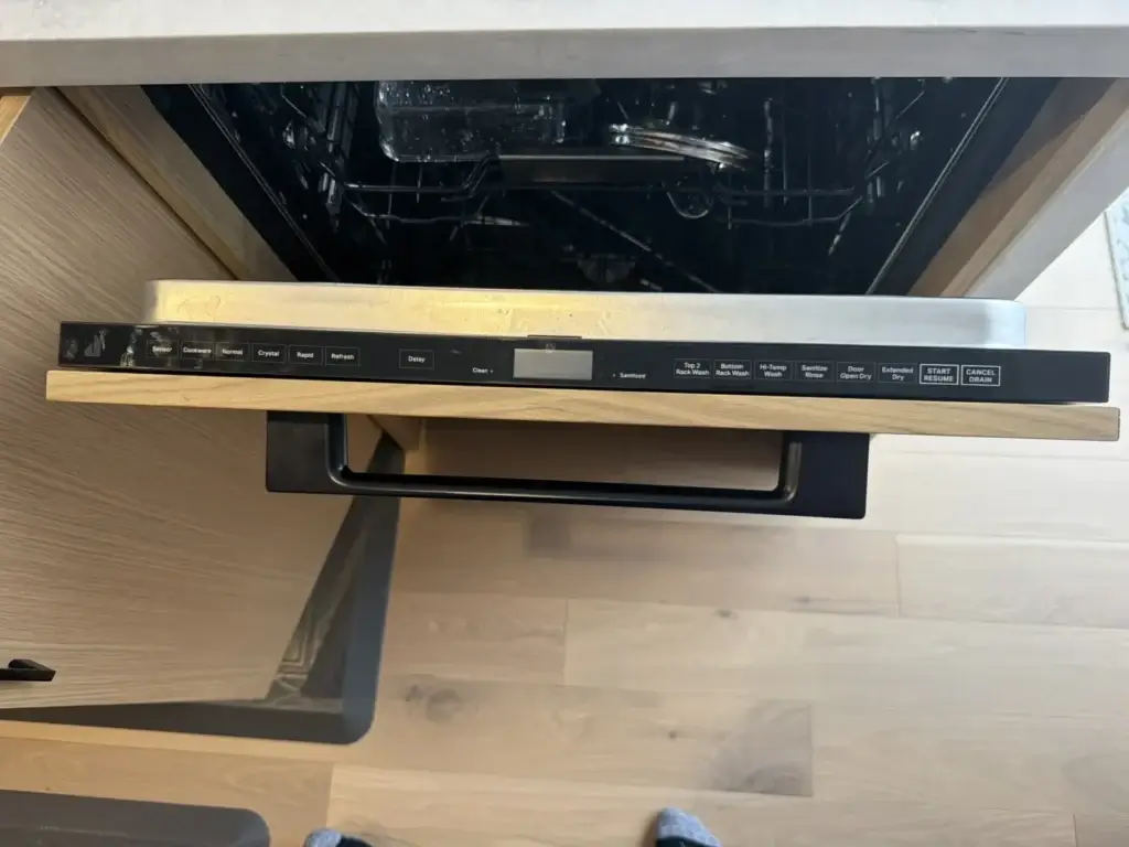 Built-in dishwasher control panel checked during a service call