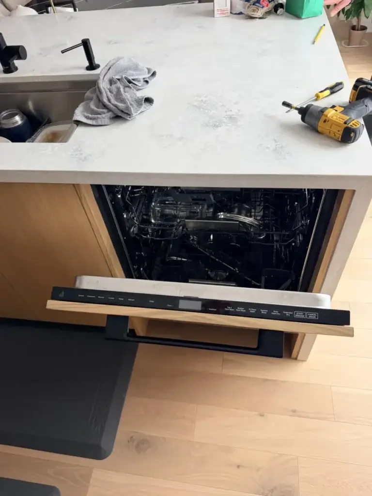 dishwasher repair open dishwasher built wooden cabinet below kitchen counter tow