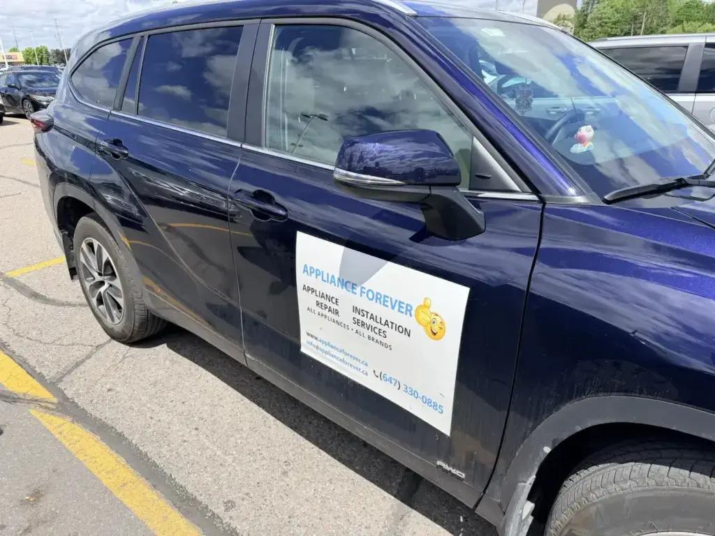 Appliance Forever service vehicle with the door magnet listing appliance repair and installation services