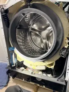 washer repair open front load washer stainless drum outer tub exposed during rep